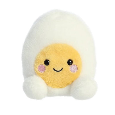 A yellow plush egg with a black embroidered smiley face.