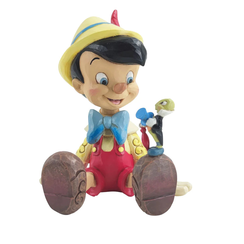 Pinocchio & Jiminy Sitting Disney Traditions