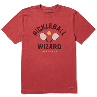 "Pickleball Wizard" combines the name of the sport pickleball with the word "wizard" which refers to a skilled or magical person. So, a "pickleball wizard" would be someone who is very skilled at playing pickleball.
