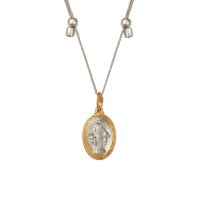 Gold necklace with a Miraculous Medal featuring the Virgin Mary.