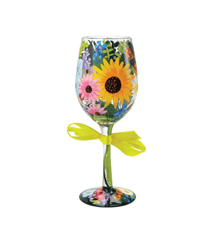 A Lolita brand wine glass with a hand-painted