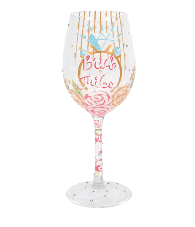 A Lolita brand wine glass with a hand-painted