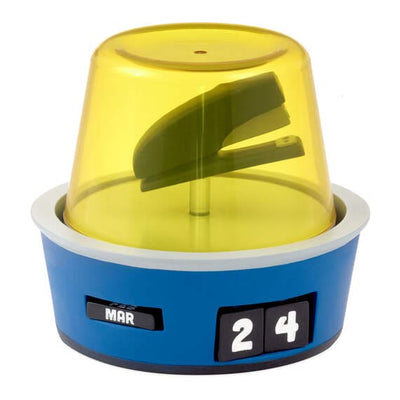 Yellow desk calendar with a stapler inside it. The date "24" and "MAR" are printed on the calendar. Text on the calendar says "PERPETUAL CALENDAR".  pen_spark     tune  share   more_vert