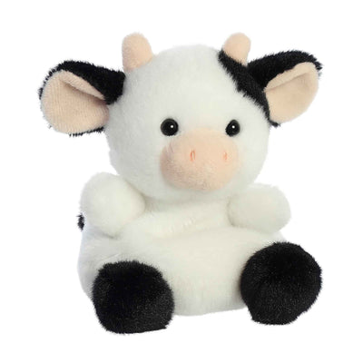 Light brown plush dog with floppy ears, a brown nose, and a black and white spotted belly.