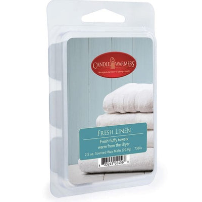Fresh Linen Classic Wax Melts: Melts are made of soy wax, which is both biodegradable and sustainably sourced.There are cosmetics and a hairbrush on the desk