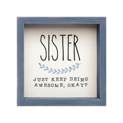 Sister Framed Sign It features a blue watercolor vine trailing between the words and a slightly distressed blue frame.