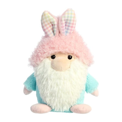 Stuffed gnome wearing pink bunny hat with floppy ears
