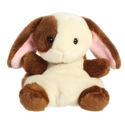 Brown and white plush bunny rabbit with pink ears and a brown nose