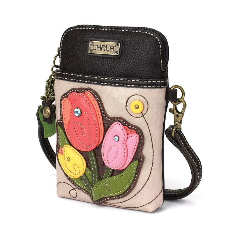 Small pink purse with floral pattern. Detachable crossbody strap