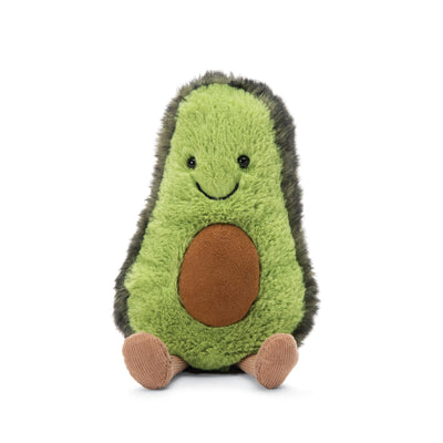 Stuffed avocado plush toy with a smile