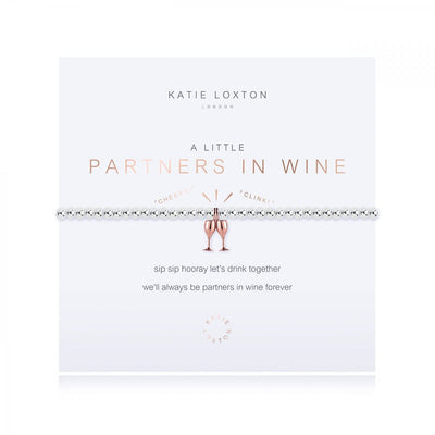 features a rose gold wine glass charm and is presented on a branded card with the "Partners In Wine" title in rose gold.
