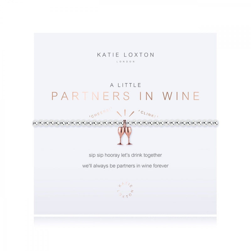 features a rose gold wine glass charm and is presented on a branded card with the "Partners In Wine" title in rose gold.