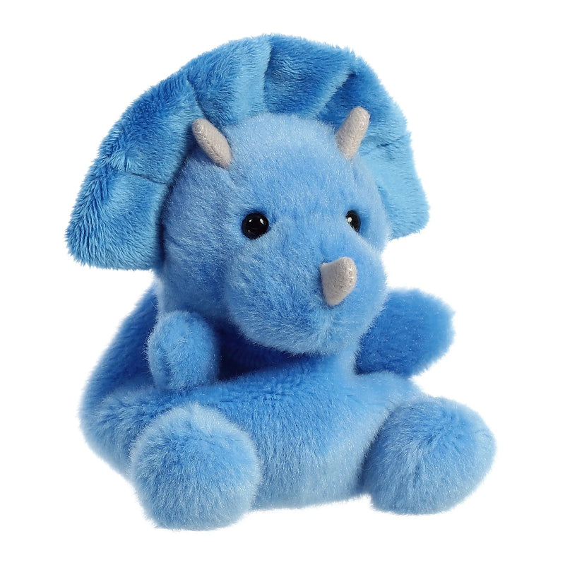 Blue plush dinosaur toy with short horns and yellow chest