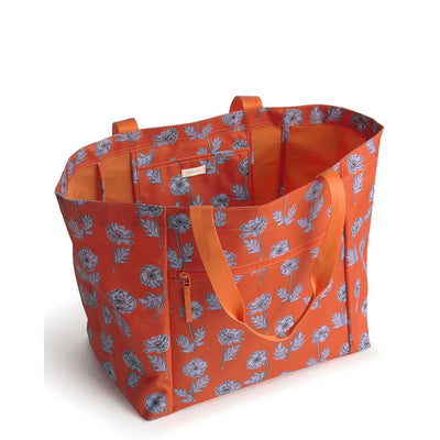 Large floral Vera Bradley family tote with top handles and interior zip and slip pockets