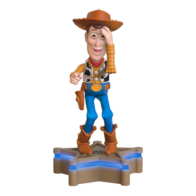 Hallmark Keepsake Toy Story Sheriff Woody ornament, cowboy figure with sound and light, Pixar Christmas tree decoration.