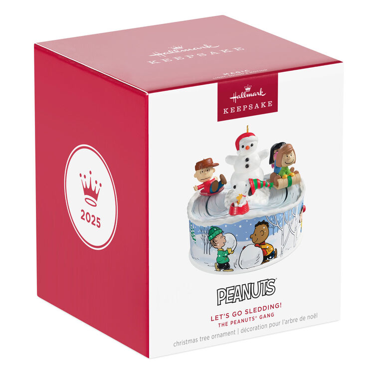 Peanuts Gang sledding ornament with Snoopy, Lucy, and snowman, light-up musical Christmas scene, Hallmark Keepsake motion collectible
