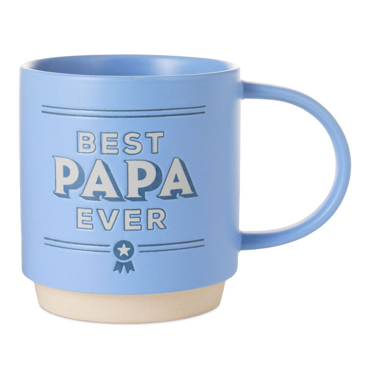 Bright blue ceramic mug with "Best Papa Ever" text, blue ribbon design, oversized handle, and recessed base for stacking.