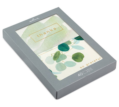 Hallmark assorted thank-you cards featuring watercolor eucalyptus and green brushstroke designs with gold foil lettering, boxed set of 40.
