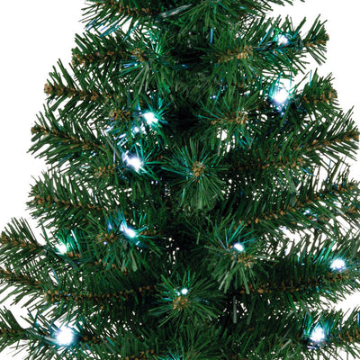 17-inch pre-lit green tabletop Christmas tree with white lights, part of ShowToppers system for sound and light synchronization.