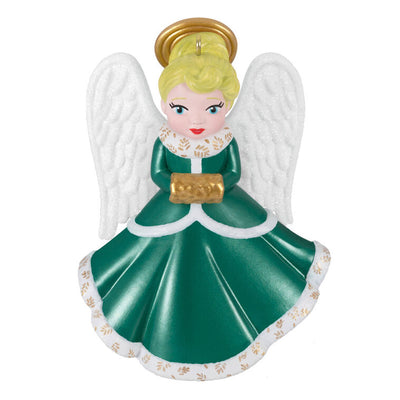 Hallmark Keepsake ornament of blonde angel in green and white dress with gold trim, glittery wings, and gold muff