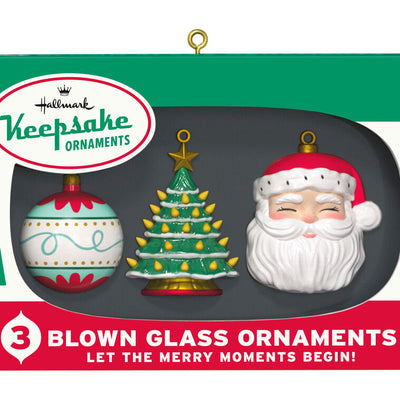 Retro ornament box with three vintage-style glass ornaments: ball, tree, and Santa face