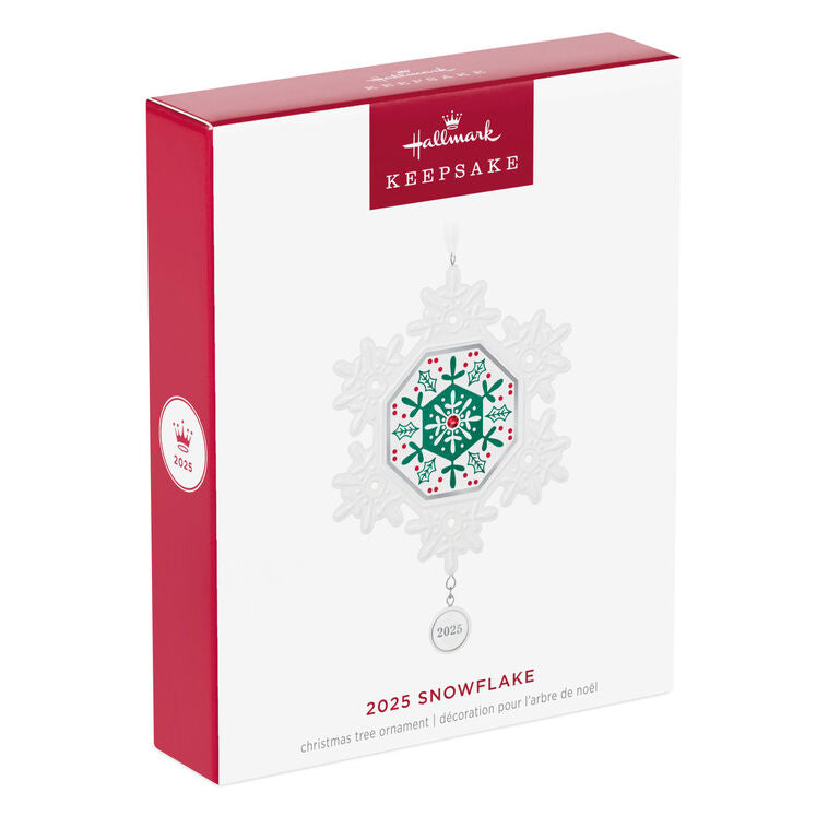 Elegant white porcelain snowflake ornament with red and green accents and red gemstone for 2025