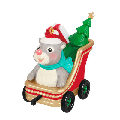 Hallmark Keepsake Cute as a Button ornament with a gray and white hamster in red sleigh, Santa hat, and Christmas tree.