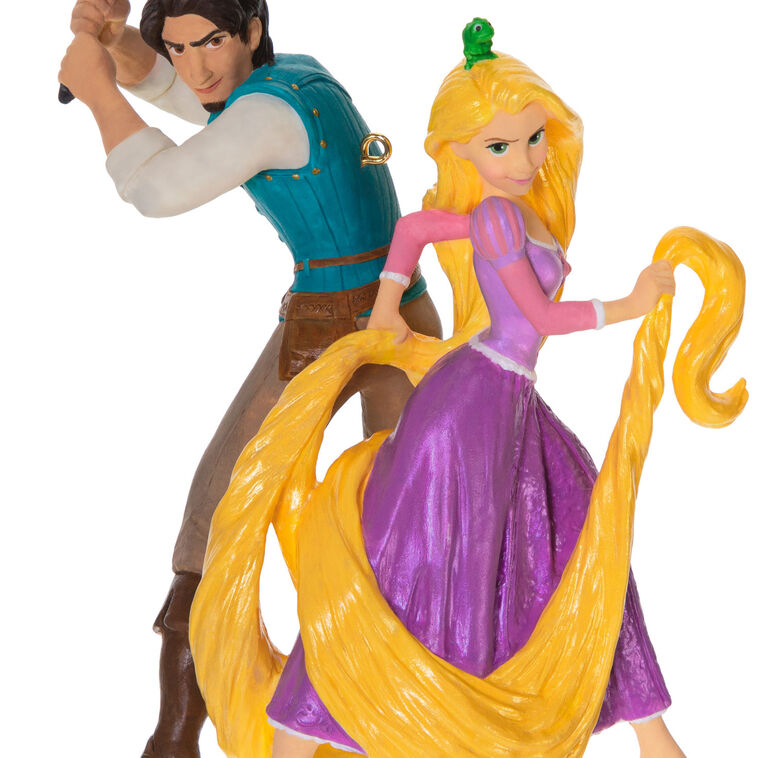 Rapunzel and Flynn Rider ornament from Disney’s Tangled, in action pose with long hair and frying pan