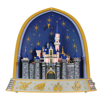 Disneyland 70th Anniversary ornament featuring Sleeping Beauty Castle, fireworks display, and shimmering lights in gold frame arch