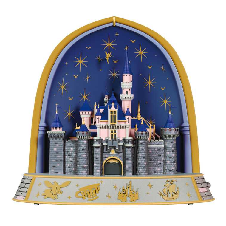 Disneyland 70th Anniversary ornament featuring Sleeping Beauty Castle, fireworks display, and shimmering lights in gold frame arch