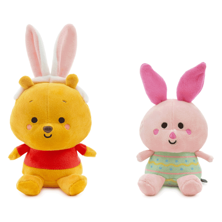 Disney plush Pooh in bunny ears and Piglet in an Easter egg outfit with magnetic connectors for spring gifting.
