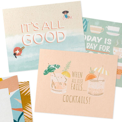 Tropical memo cube set with palm tree and stripe artwork, note pad, displayable prints, and pastel note cards.
