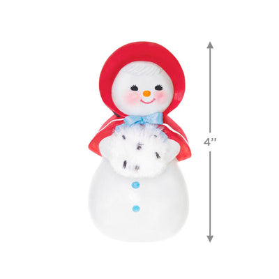Hallmark Keepsake Sweet Snow Girl porcelain ornament, vintage snow lady with red bonnet, rosy cheeks, and fluffy scarf.