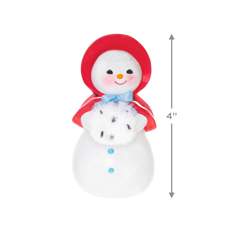 Hallmark Keepsake Sweet Snow Girl porcelain ornament, vintage snow lady with red bonnet, rosy cheeks, and fluffy scarf.