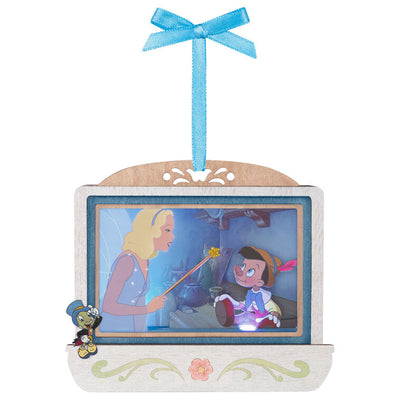 Disney Pinocchio 85th anniversary papercraft ornament with Blue Fairy and Geppetto’s puppet, lit with special effects.


