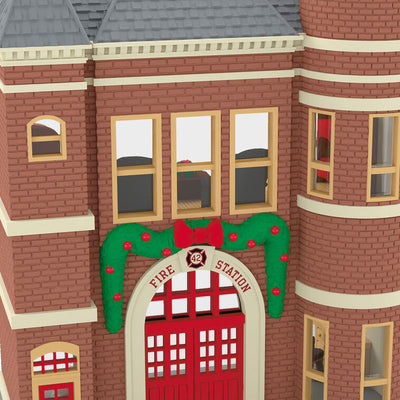 Red brick firehouse with festive garland, red door, and dalmatian dog, Hallmark Keepsake Korners Christmas ornament