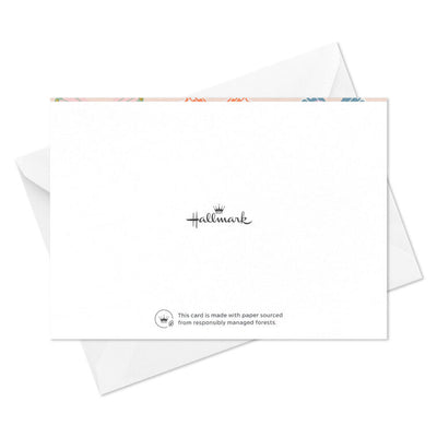 Blank note cards with colorful butterfly illustrations and gold foil accents on a soft peach background.