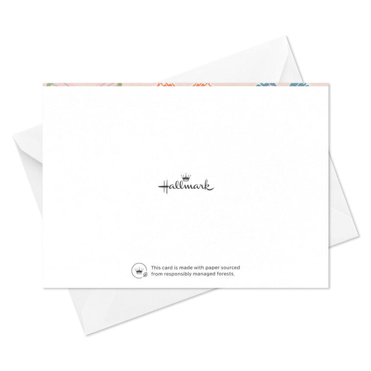Blank note cards with colorful butterfly illustrations and gold foil accents on a soft peach background.