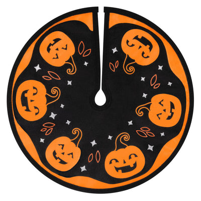Mini Halloween tree skirt with orange and black design, smiling jack-o’-lanterns, and embroidered accents
