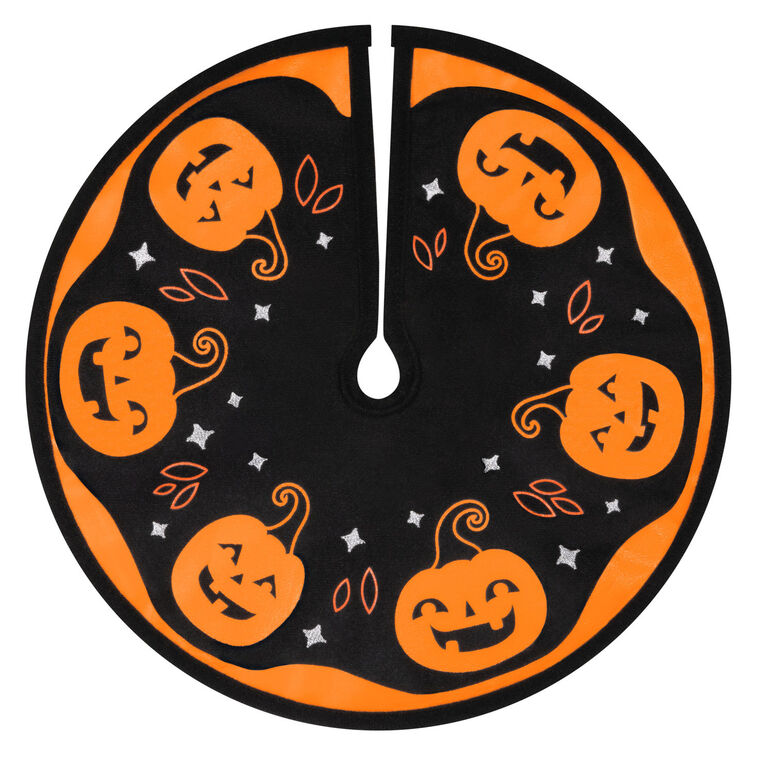 Mini Halloween tree skirt with orange and black design, smiling jack-o’-lanterns, and embroidered accents
