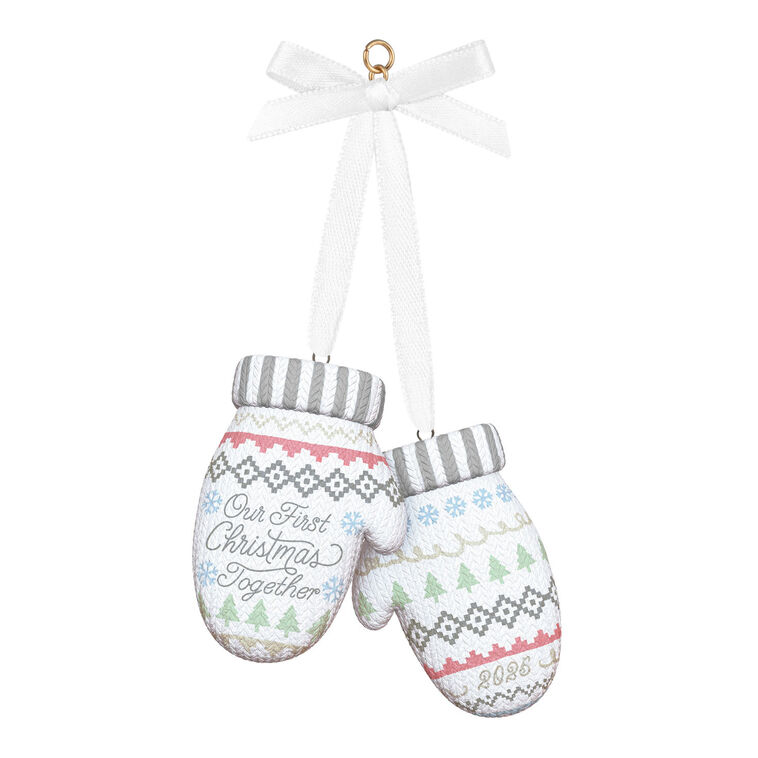 Porcelain Christmas ornament with pair of colorful knit mittens and “Our First Christmas Together 2025” message

