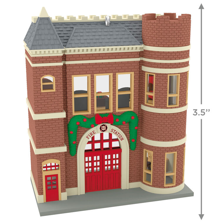 Red brick firehouse with festive garland, red door, and dalmatian dog, Hallmark Keepsake Korners Christmas ornament