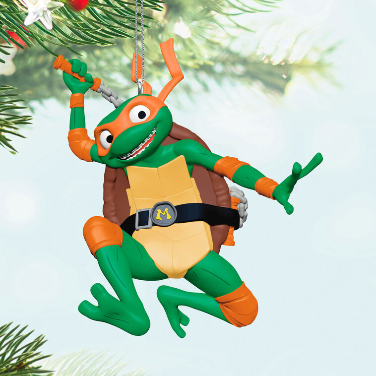 Michelangelo Teenage Mutant Ninja Turtle ornament in orange mask with nunchucks, Hallmark Keepsake Christmas tree decoration.