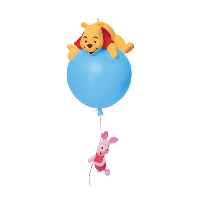 Hallmark Keepsake Disney Winnie the Pooh ornament, Pooh on blue balloon with Piglet hanging, light-up holiday tree decoration.