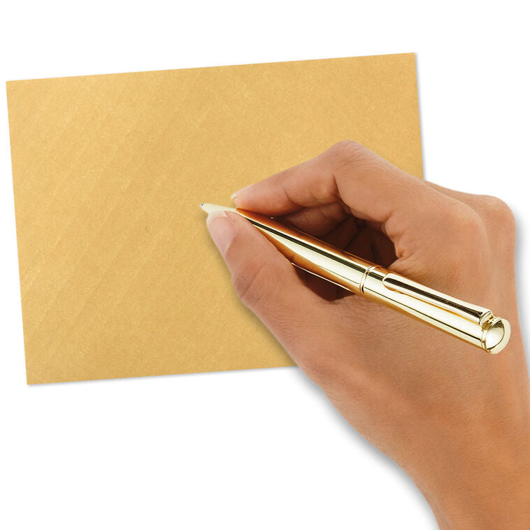 Gold metallic envelopes with white and gold chevron liner and pointed flaps, perfect for cards and special occasions.
