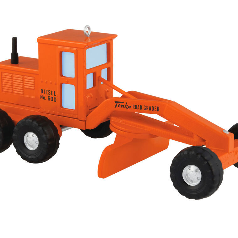 Hallmark Keepsake Hasbro Tonka Road Grader ornament, orange die-cast metal construction vehicle toy with turning wheels, vintage-style design.