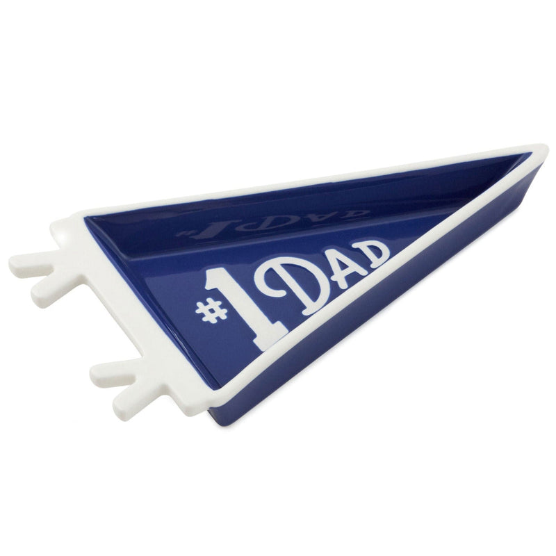 
Pennant-shaped ceramic trinket tray with navy blue glaze and white "