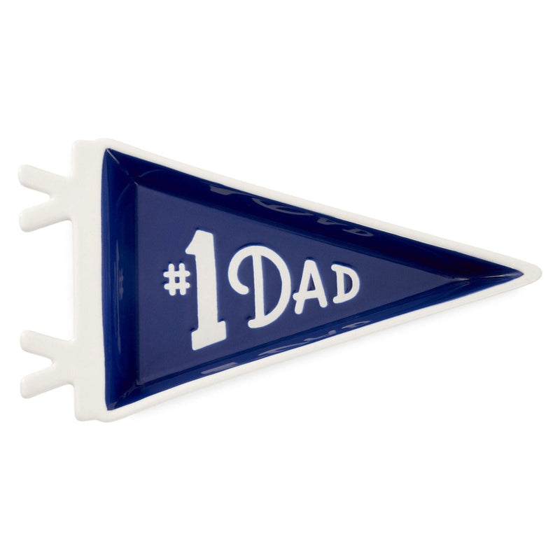 
Pennant-shaped ceramic trinket tray with navy blue glaze and white "