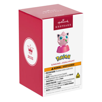 Hallmark Keepsake Pokémon Jigglypuff ornament, pink and round, singing into green microphone, with sound, on pink base.