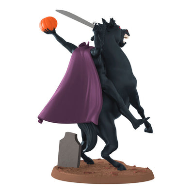 Headless Horseman Halloween ornament from Disney's Sleepy Hollow, riding black horse with sword and jack-o'-lantern
